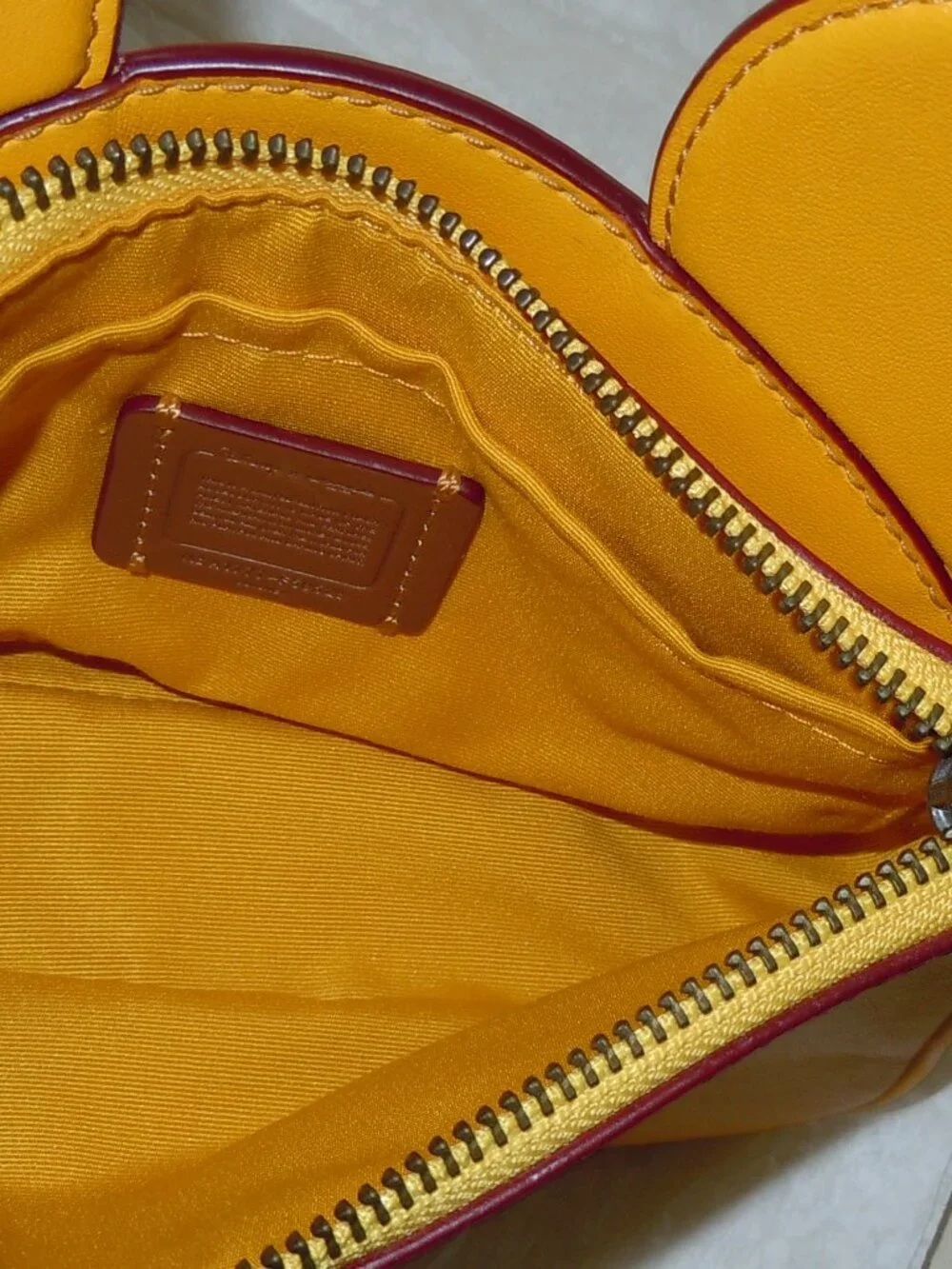 COACH DISNEY F59529 MICKEY MOUSE EARS WRISTLET YELLOW LEATHER EUC